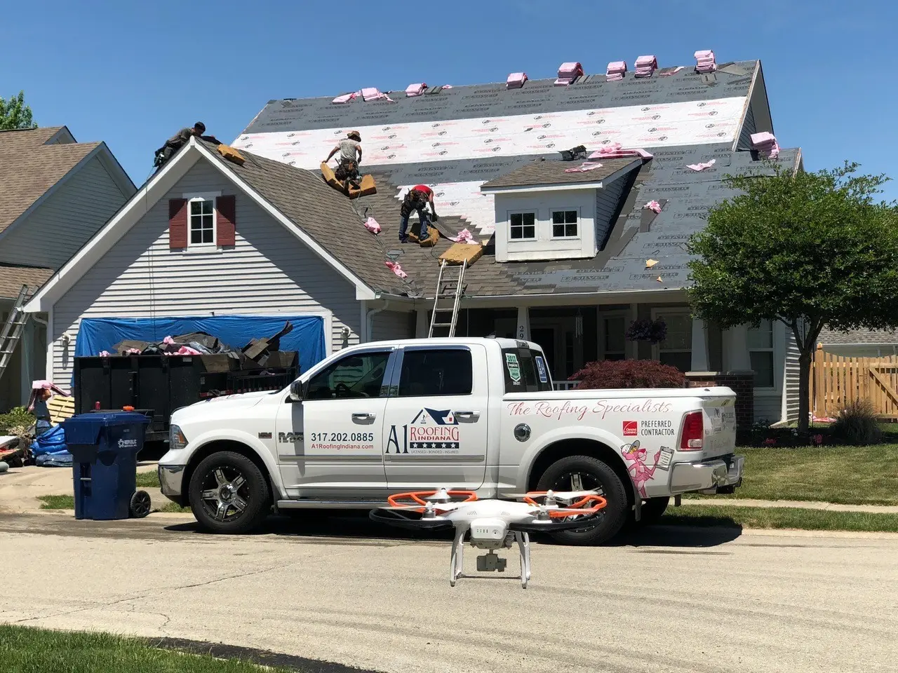 Crew and truck on a job